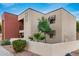 Building exterior showcasing landscaping and architectural details at 1340 N Recker Rd # 256, Mesa, AZ 85205