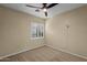 Well lit bedroom with window shutters and ceiling fan at 17219 N 19Th Run, Phoenix, AZ 85022