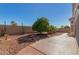 Landscaped backyard with fire pit and plants at 20047 N 109Th Dr, Sun City, AZ 85373