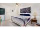 Cozy bedroom with a queen-size bed and a ceiling fan at 2650 W Union Hills Dr # 155, Phoenix, AZ 85027
