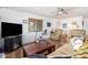 Living room with hardwood floors, comfortable seating, and a large TV at 2650 W Union Hills Dr # 155, Phoenix, AZ 85027