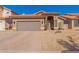 Single-story home with a two-car garage and desert landscaping at 2852 W Gail Dr, Chandler, AZ 85224