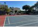 Community tennis court with adjacent seating at 7538 E Tuckey Ln, Scottsdale, AZ 85250