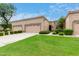 Two-story home with a two-car garage and landscaped yard at 8351 W Taro Ln, Peoria, AZ 85382