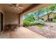 Spacious tiled patio with seating area and view of backyard at 8351 W Taro Ln, Peoria, AZ 85382
