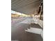 Covered patio with steps leading to the entrance at 9427 E University Dr # 46, Mesa, AZ 85207