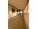 Long covered patio with access to home's entrance at 9427 E University Dr # 46, Mesa, AZ 85207