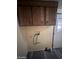 Laundry closet with upper cabinets and hookups at 9427 E University Dr # 46, Mesa, AZ 85207