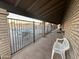 Community pool area with seating and a covered walkway at 9427 E University Dr # 46, Mesa, AZ 85207