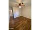 Bedroom with ceiling fan and wood-look tile flooring at 1011 W Northern Ave, Phoenix, AZ 85021