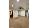 Spacious bedroom with ceiling fan, carpet, and ample closet space at 1011 W Northern Ave, Phoenix, AZ 85021