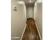 Hallway with wood-look tile flooring at 1011 W Northern Ave, Phoenix, AZ 85021