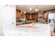 Kitchen island with granite countertop offering additional prep space at 1011 W Northern Ave, Phoenix, AZ 85021