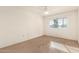 Bright bedroom with ceiling fan and window coverings at 10524 W Snead Dr, Sun City, AZ 85351