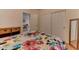 Bright bedroom with double closet and view of additional living space at 17200 W Bell Rd # 1218, Surprise, AZ 85374