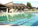 Inviting community pool with ample seating and covered areas at 17200 W Bell Rd # 1218, Surprise, AZ 85374