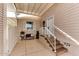 Home exterior with covered patio, steps, and small sitting area at 17200 W Bell Rd # 1218, Surprise, AZ 85374