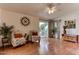 Relaxing living room featuring hardwood floors and comfortable seating at 17200 W Bell Rd # 1218, Surprise, AZ 85374