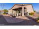 Covered patio with seating area and view of the pool at 18668 W Chuckwalla Canyon Rd, Goodyear, AZ 85338