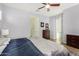 King-size bedroom with two closets and ceiling fan at 18668 W Chuckwalla Canyon Rd, Goodyear, AZ 85338