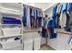Spacious closet with shelves and hanging clothes at 18668 W Chuckwalla Canyon Rd, Goodyear, AZ 85338