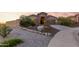 Charming one-story home with a two-car garage and landscaped front yard at 18668 W Chuckwalla Canyon Rd, Goodyear, AZ 85338