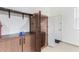 Organized garage with storage cabinets and workbench at 18668 W Chuckwalla Canyon Rd, Goodyear, AZ 85338