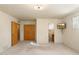 Bright bedroom with double-door closet and en-suite bathroom at 2716 E Voltaire Ave, Phoenix, AZ 85032