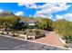 Brick-paved driveway and entrance to a single-story home at 2716 E Voltaire Ave, Phoenix, AZ 85032
