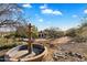 Ornate fountain and landscaping highlight the front yard of this beautiful home at 2716 E Voltaire Ave, Phoenix, AZ 85032