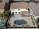 Aerial view showcasing the home, pool, and backyard at 297 W Seaside Dr, Casa Grande, AZ 85122