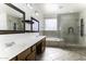Large bathroom with double vanity and walk-in shower at 297 W Seaside Dr, Casa Grande, AZ 85122