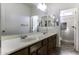 Bathroom with double vanity and access to shower at 297 W Seaside Dr, Casa Grande, AZ 85122