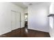 Bedroom with double door closet and wood flooring at 297 W Seaside Dr, Casa Grande, AZ 85122