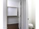 Small closet with shelving and hanging rod at 297 W Seaside Dr, Casa Grande, AZ 85122
