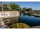 Community entrance with a stone wall and water feature at 297 W Seaside Dr, Casa Grande, AZ 85122