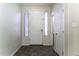 Bright entryway with tiled floors and neutral colors at 297 W Seaside Dr, Casa Grande, AZ 85122