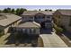 Two-story home with a charming front yard and driveway at 297 W Seaside Dr, Casa Grande, AZ 85122