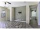 Spacious living room with tile floors and access to backyard at 297 W Seaside Dr, Casa Grande, AZ 85122