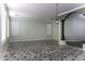 Large living room with tiled floors and an abundance of natural light at 297 W Seaside Dr, Casa Grande, AZ 85122