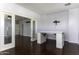 Home office with built-in desk and hardwood floors at 297 W Seaside Dr, Casa Grande, AZ 85122