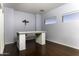 Home office with hardwood floors and large windows at 297 W Seaside Dr, Casa Grande, AZ 85122