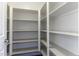 Bright walk-in pantry with ample shelving at 297 W Seaside Dr, Casa Grande, AZ 85122