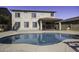 View of kidney shaped pool and house at 297 W Seaside Dr, Casa Grande, AZ 85122