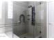 Large walk-in shower with multiple shower heads and glass enclosure at 297 W Seaside Dr, Casa Grande, AZ 85122