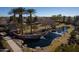 Community pond with waterfall and landscaping at 297 W Seaside Dr, Casa Grande, AZ 85122