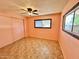 Bedroom with light peach walls and tile floors at 303 S Recker Rd # 175, Mesa, AZ 85206