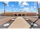 Ranch-style home with landscaped walkway and desert landscaping at 303 S Recker Rd # 175, Mesa, AZ 85206