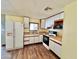 Clean kitchen, white cabinets, and appliances at 303 S Recker Rd # 175, Mesa, AZ 85206