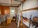Workshop with shelves, ladder, and workbench at 303 S Recker Rd # 175, Mesa, AZ 85206